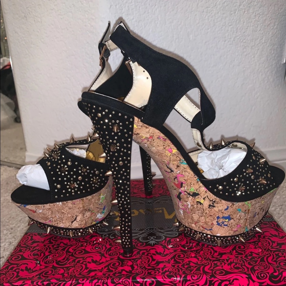 Black pumps with spikes all over